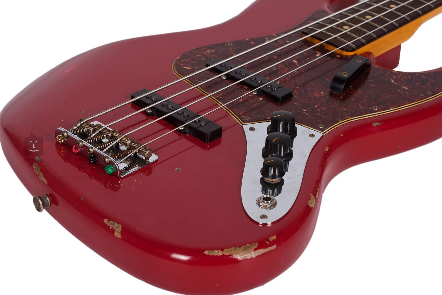 fender maroon electric bass guitar