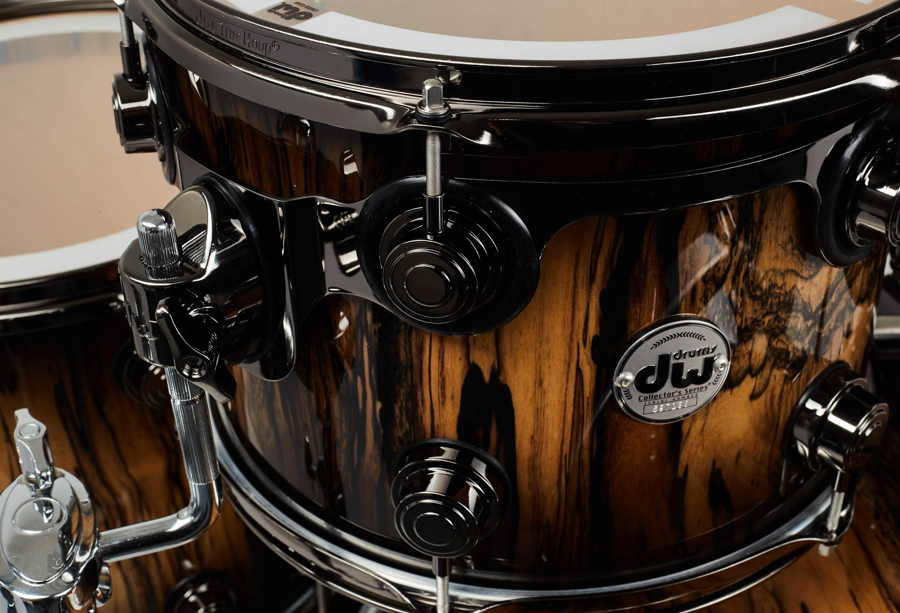 DW Collector´s Natural to Black Burst over Royal Ebony Drumstel